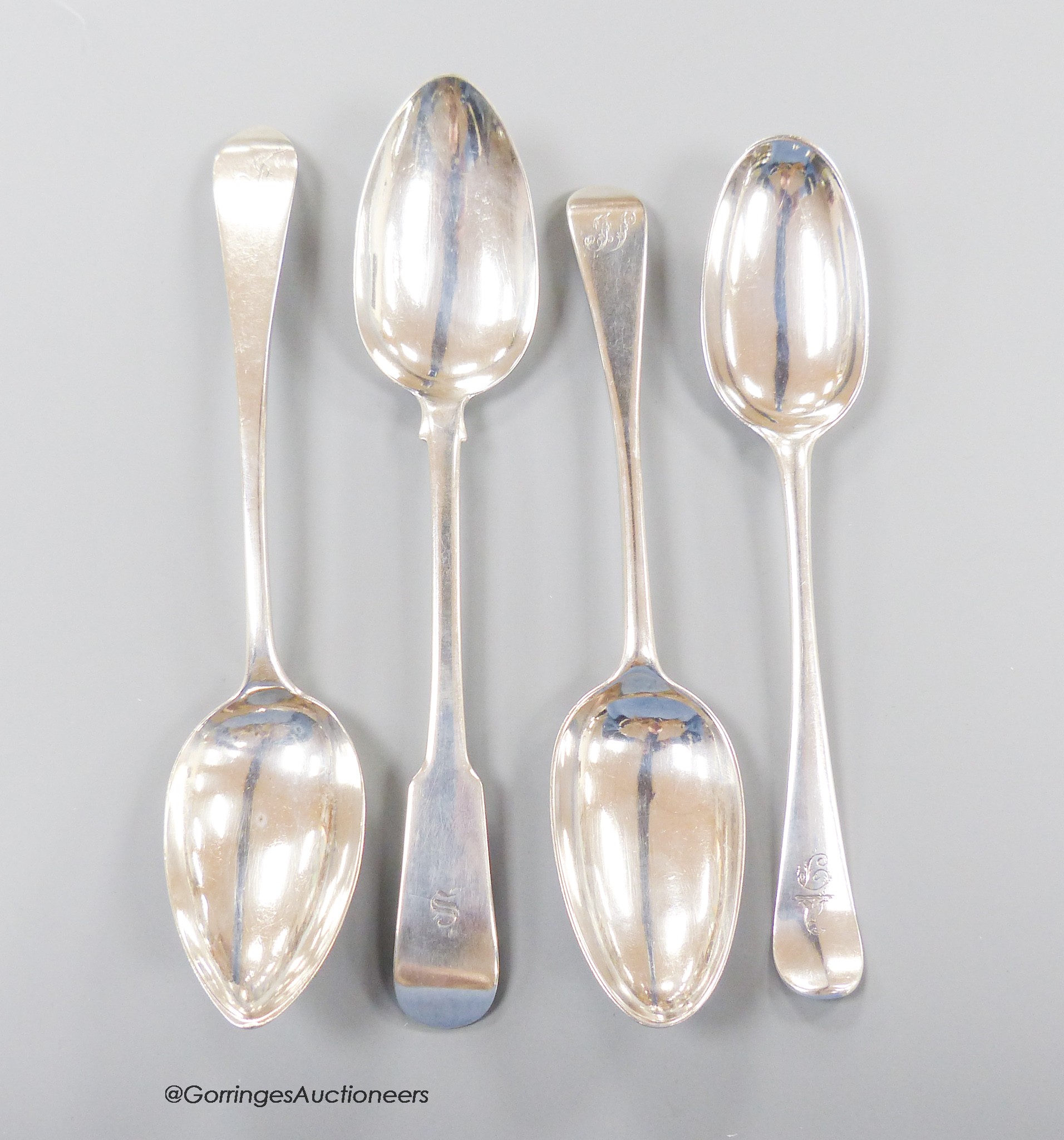 Three 18th century Scottish provincial Dundee table spoons (John Steven, William Scott and James Douglas) and a later fiddle pattern tablespoon, possibly Dundee?, 23cm, 8.5oz.